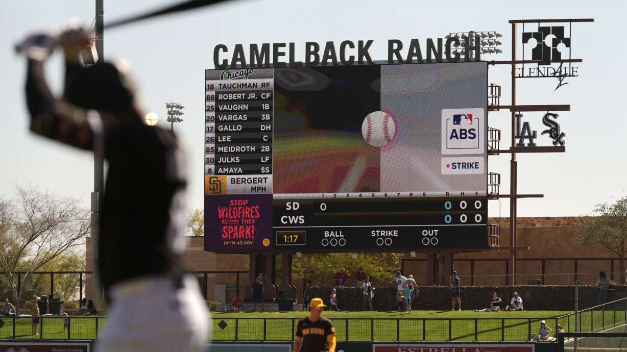 FILE - The Automated Ball-Strike System plays on the scoreboard after a pitch call was challenged during the first inning of a spring training baseball game between the Chicago White Sox and the San Diego Padres, Feb. 26, 2025, in Phoenix.