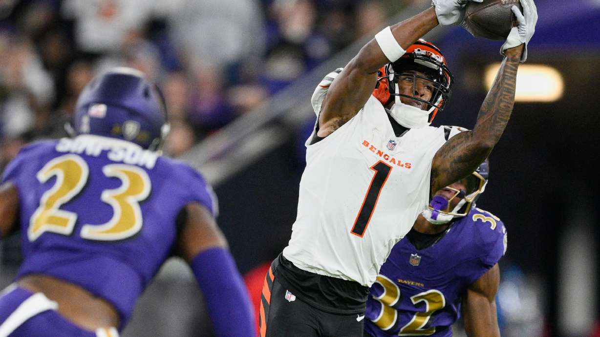 FILE - Cincinnati Bengals wide receiver Ja'Marr Chase (1) reaches for a pass during the first half of an NFL football game against the Baltimore Ravens, Thursday, Nov. 7, 2024, in Baltimore.