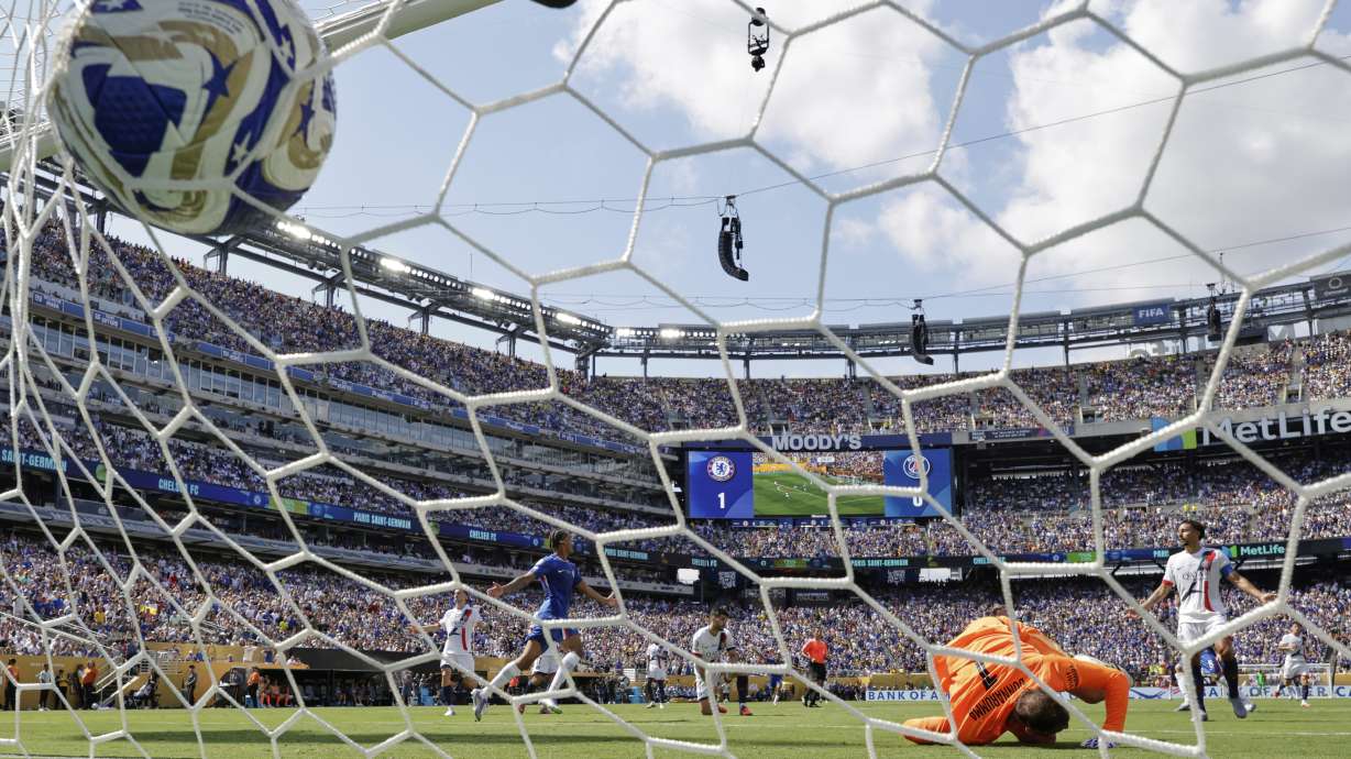 Paris Saint-Germain's goalkeeper Gianluigi Donnarumma can't make the save on the second goal scored by Chelsea's Cole Palmer during the Club World Cup final soccer match between Chelsea and PSG in East Rutherford, N.J., Sunday, July 13, 2025.