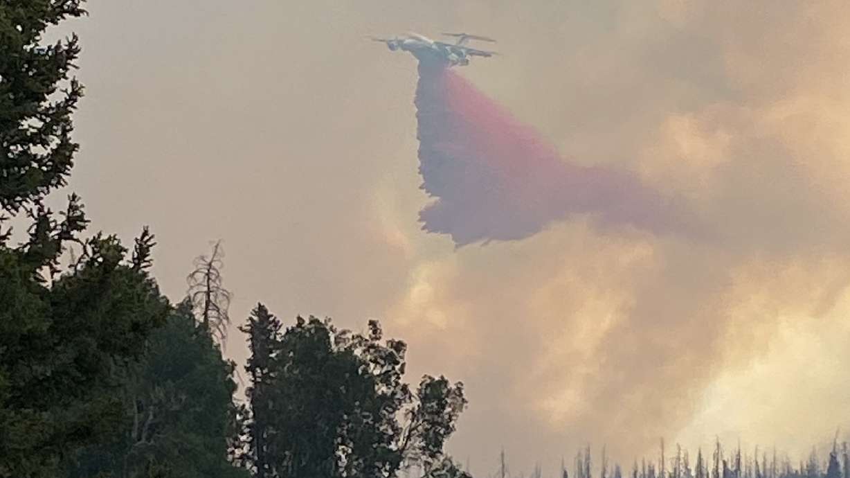 Crews battle the Monroe Canyon Fire by Monroe Mountain in Sevier County on Tuesday. The fire has now burned over 5,000 acres and remains 0% contained.