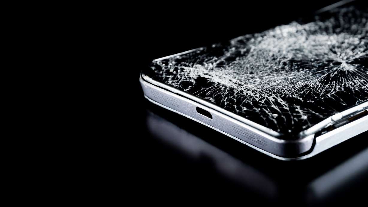 Two men who prosecutors say yelled a homophobic slur while robbing a gay man of his phone have each been charged with a hate crime.