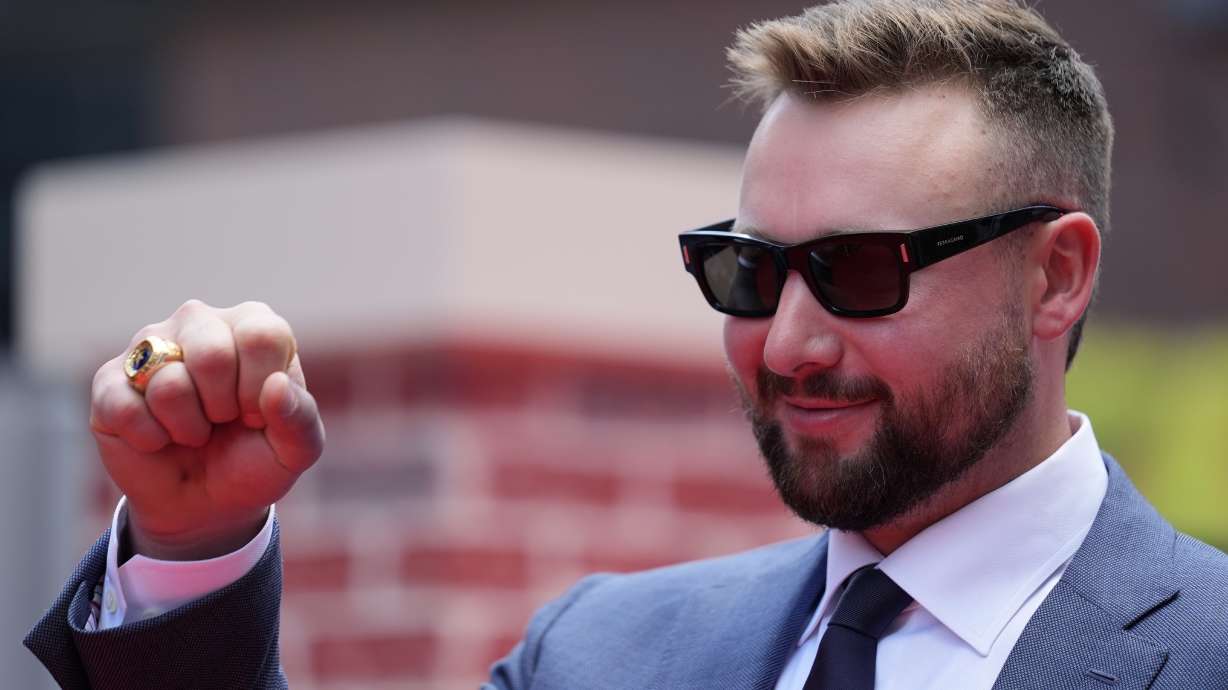 Seattle Mariners' Cal Raleigh arrives on the red carpet for the MLB baseball All-Star game, Tuesday, July 15, 2025, in Atlanta.