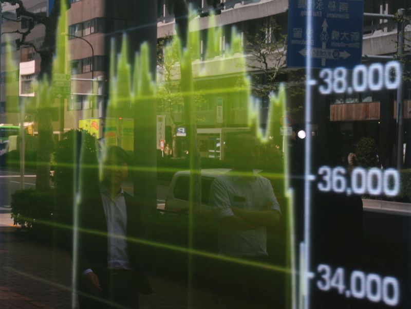 Markets turn volatile after reports Trump considered firing Fed chair Powell