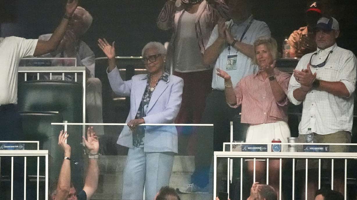 Billye Aaron, wife of baseball great Hank Aaron waves during at the MLB baseball All-Star game between the American League and National League, Tuesday, July 15, 2025, in Atlanta.
