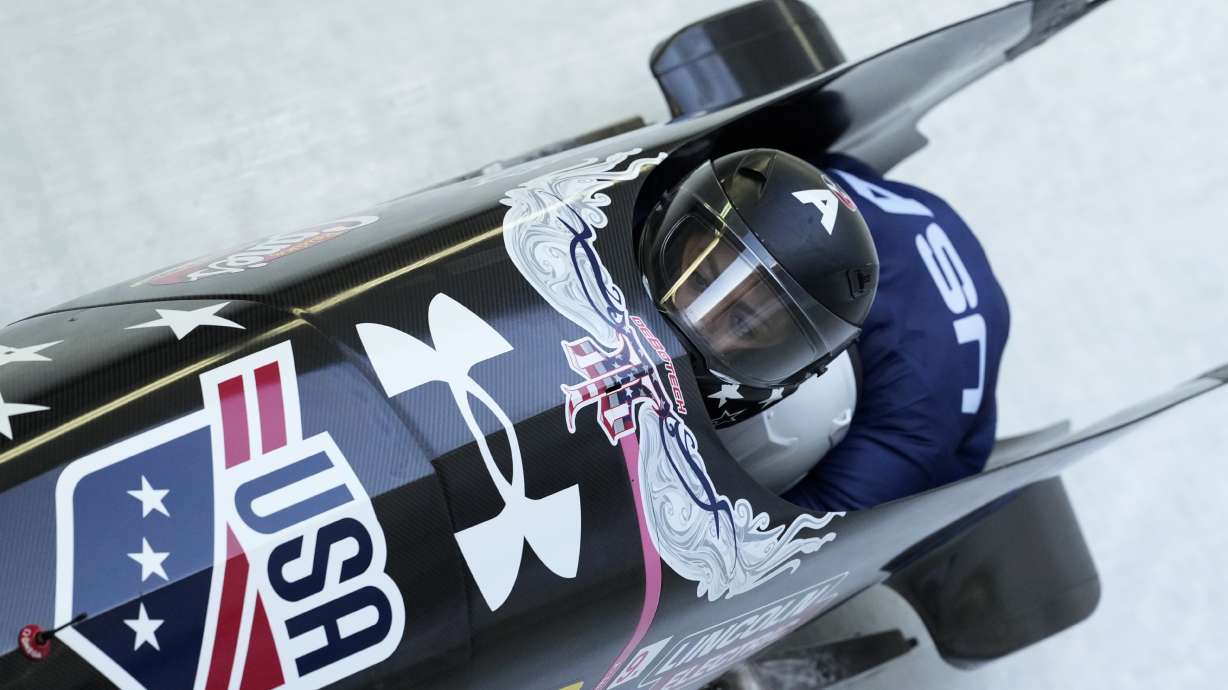 FILE - Kaysha Love and Emily Renna, of the United States, speed down the track during the first run of the 2-woman bobsleigh, at the Bobsleigh World Cup in Innsbruck, Austria, Sunday, Jan. 19, 2025.