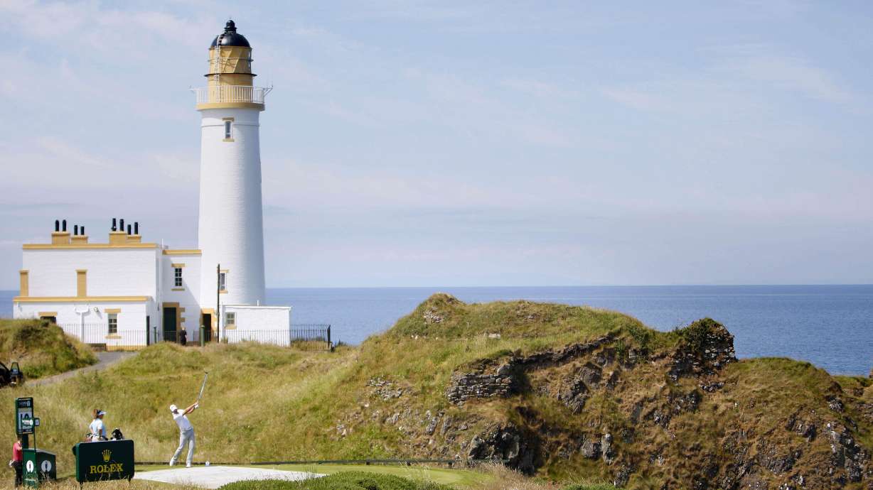 FILE - Sweden's Henrik Stenson tees off on the 10th hole with the Turnberry Lighthouse in the background, during a practice round for the British Open Golf Championship at Turnberry Golf Course, Scotland, July 11, 2009.