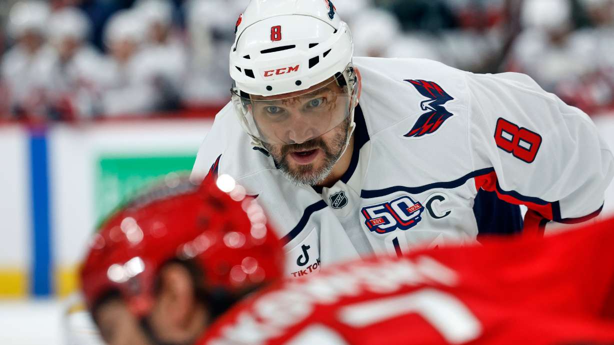 FILE - Washington Capitals' Alex Ovechkin (8) looks on during a faceoff against the Carolina Hurricanes during the first period of an NHL hockey game in Raleigh, N.C., Wednesday, April 2, 2025.