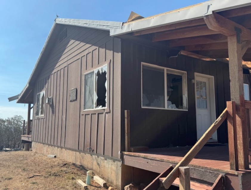 13 structures damaged or destroyed by Deer Creek Fire; rare 'firenado' rated as EF-2