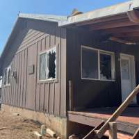 13 structures damaged or destroyed by Deer Creek Fire; rare 'firenado' rated as EF-2