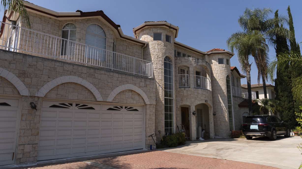 The home of Silvia Zhang and Guojun Xuan is seen on Wednesday, in Arcadia, Calif., where a number of children were removed from the couple's home after a child abuse allegation in May, according to Arcadia police.