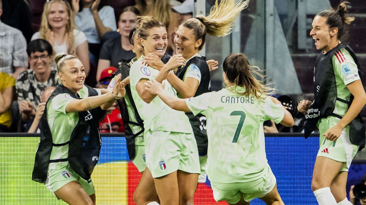 Italy's Cristiana Girelli, second from left, celebrates with teammates after scoring the opening goal during the Women's Euro 2025 quarterfinals soccer match between Norway and Italy at Stade de Geneve in Geneva, Switzerland, Wednesday, July 16, 2025.