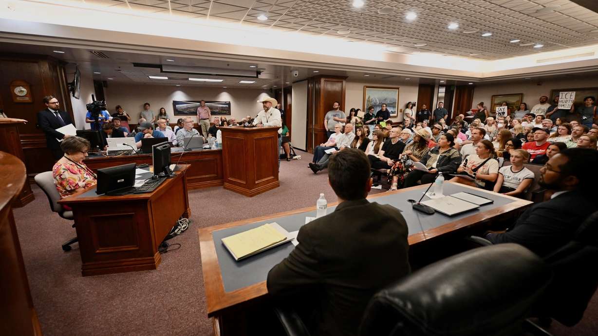 Utah County Sheriff Mike Smith addresses a proposal to bolster cooperative efforts with federal immigration authorities at a meeting Wednesday of the Utah County Commission in Provo. More than 100 speakers voiced opposition, but commissioners approved the plans.