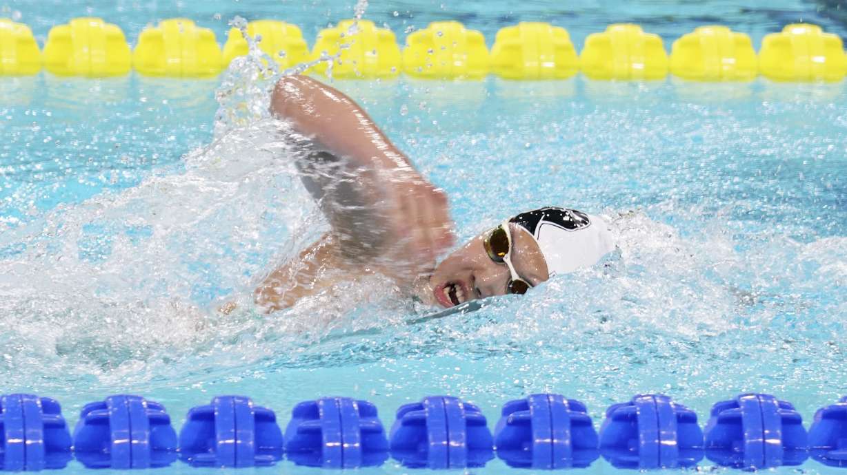In this photo taken May 24, 2025, and released by Hebei Taihua Jinye Swimming Club, 12 years old Chinese swimmer Yu Zidi competes in the final of the the Women's 400m Individual Medley for the 2025 National Swimming Championships held in Shenzhen in southern China's Guangdong province.