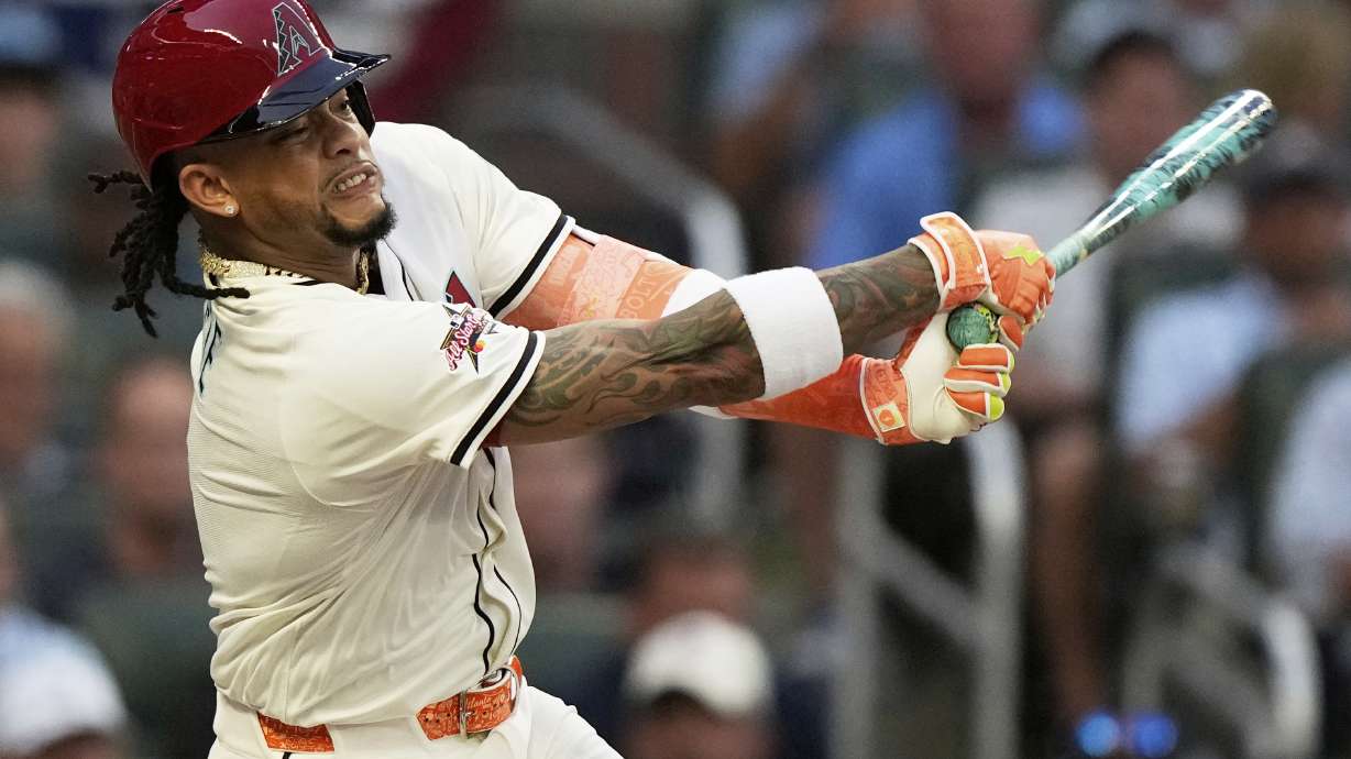Arizona Diamondbacks' Ketel Marte watches his two run double in the first at the MLB baseball All-Star game between the American League and National League, Tuesday, July 15, 2025, in Atlanta.