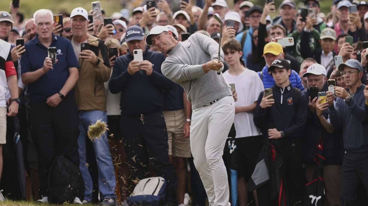 Rory McIlroy of Northern Ireland plays out of the rough on the 4th hole during the first round of the British Open golf championship at the Royal Portrush Golf Club, Northern Ireland, Thursday, July 17, 2025.