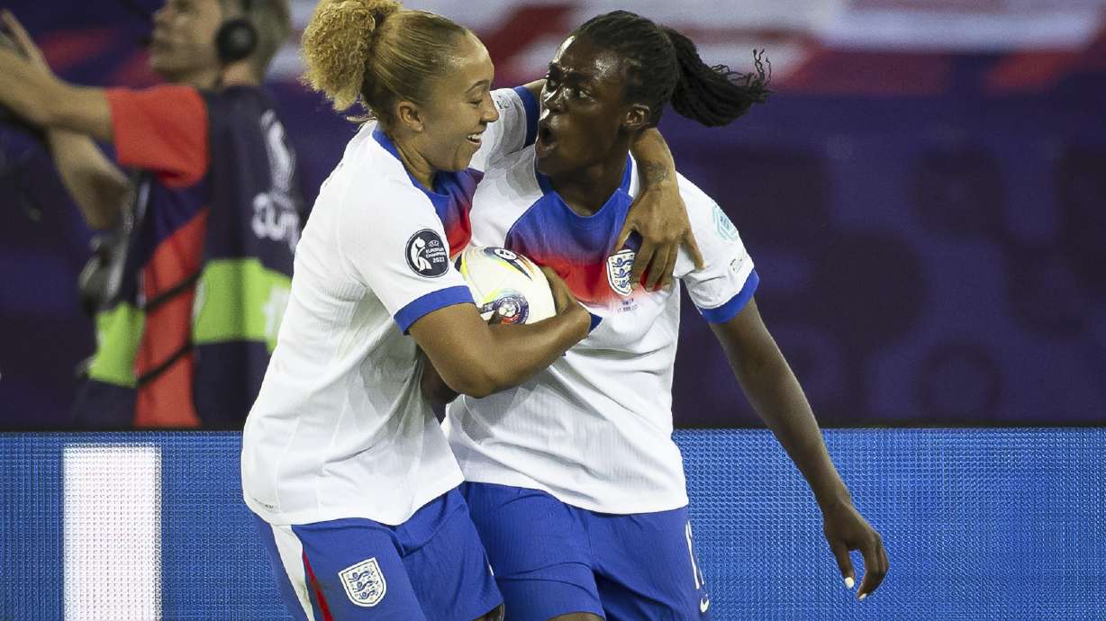 England's Michelle Agyemang, right, celebrates with Lauren James after scoring their second goal during the Women's Euro 2025 quarterfinals soccer match between Sweden and England at Stadion Letzigrund in Zurich, Switzerland, Thursday, July 17, 2025.