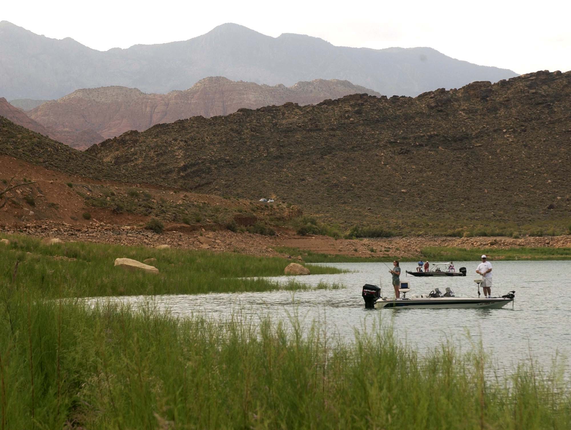 Anglers fish for Bass along the shallow banks of the Quail Creek State Park reservoir May 23, 2003.