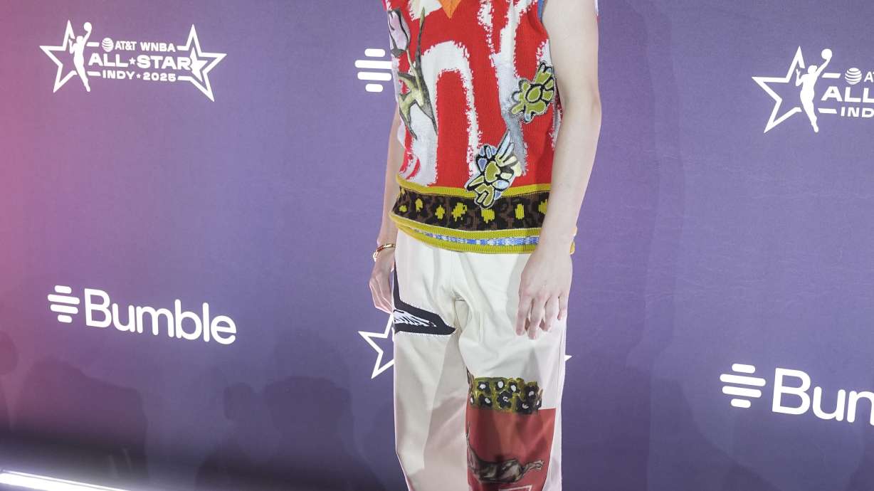 Dallas Wings' Paige Bueckers poses on the orange carpet for WNBA All Star basketball events, Thursday, July 17, 2025, in Indianapolis.