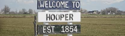 On Thursday, Hooper officials debated whether Mayor Sheri Bingham could keep her mayoral powers. The City Council voted 3-2 to to strip her of her authority, but the measure required a unanimous vote, per state law, to succeed.