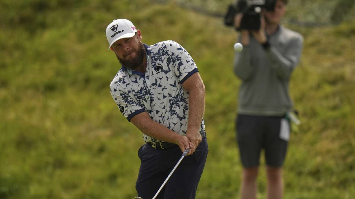 Tyrrell Hatton of England chips onto the 7th green during the second round of the British Open golf championship at the Royal Portrush Golf Club, Northern Ireland, Friday, July 18, 2025.