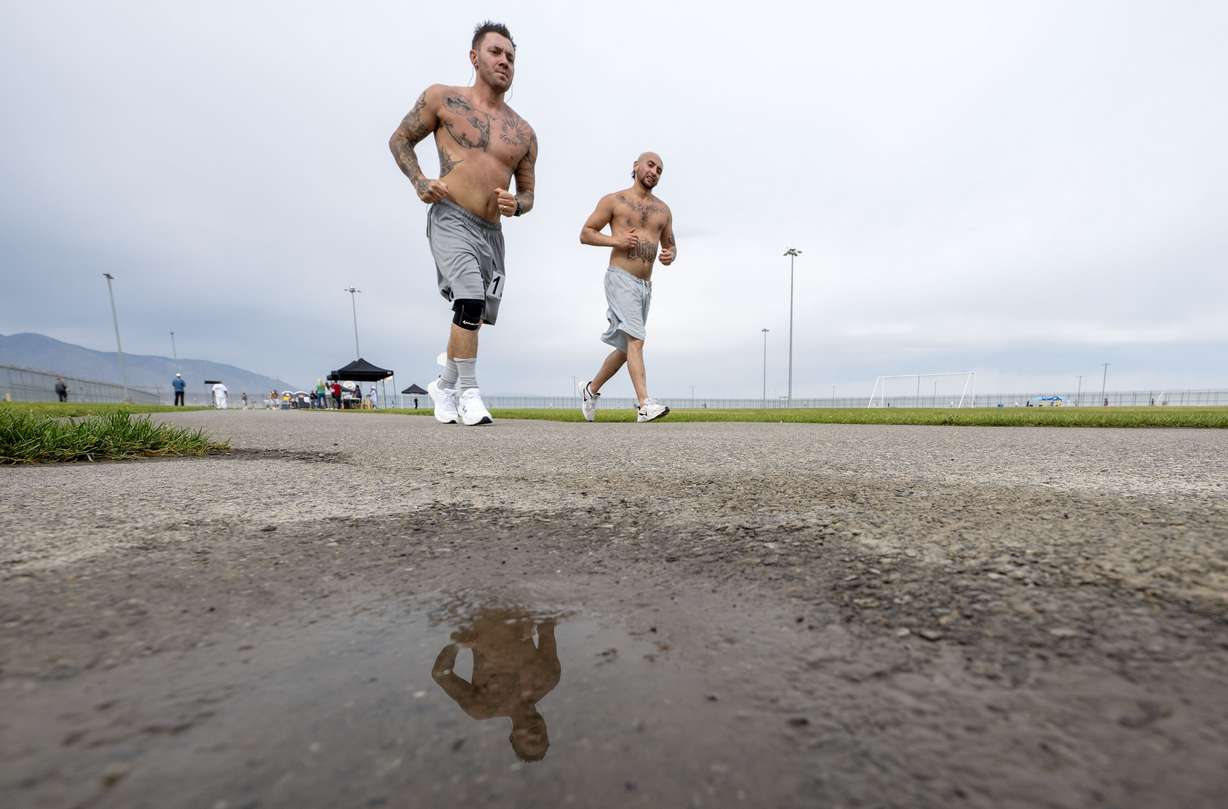Inmates at the Utah State Correctional Facility in Salt Lake City participate in a half marathon at the facility on Friday.