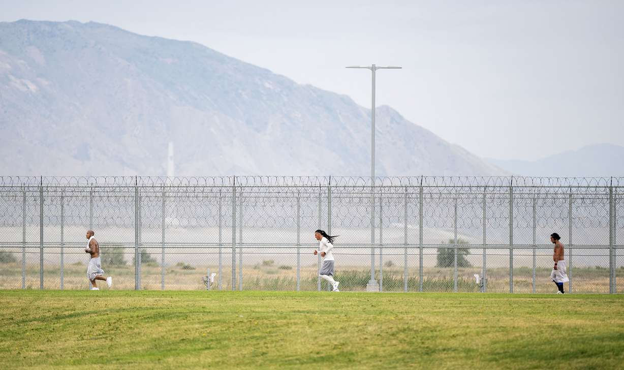 Inmates at the Utah State Correctional Facility in Salt Lake City participate in a half marathon at the facility on Friday.