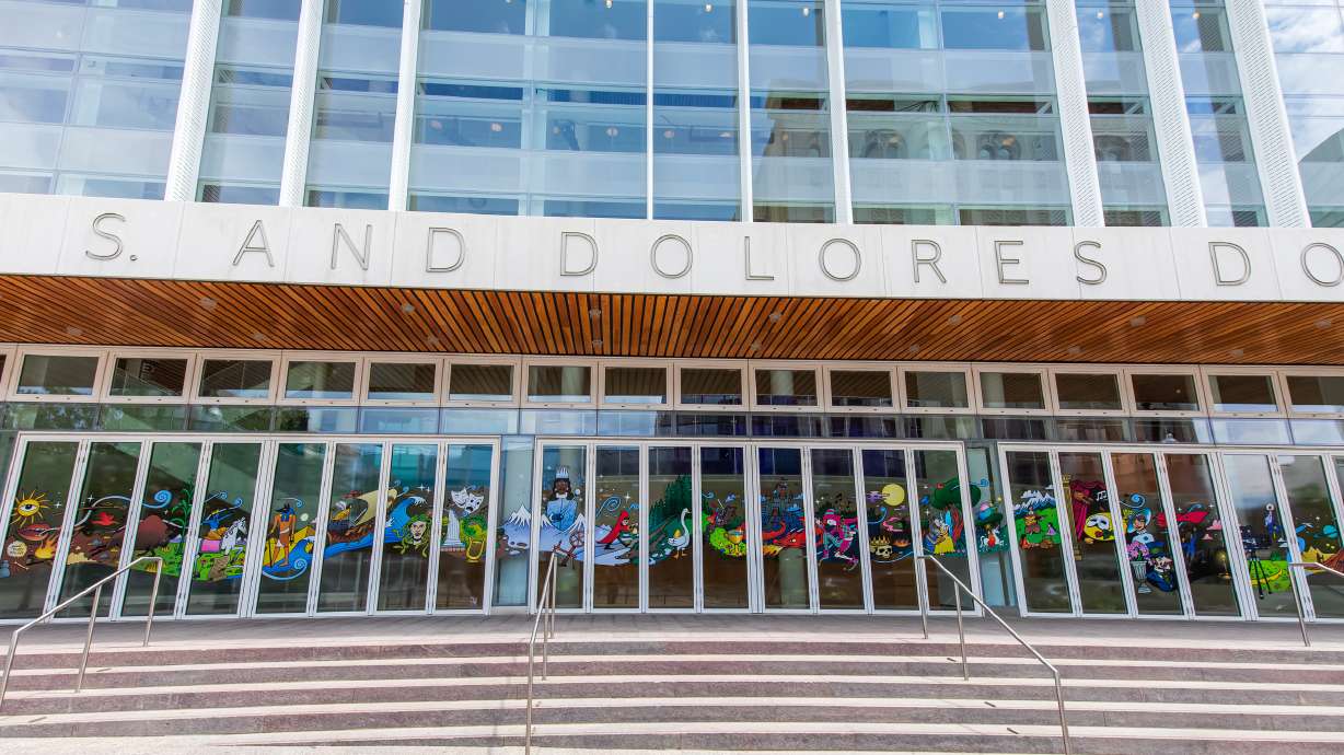"Storytelling: The Breath of Life," a window art mural by Trevor Dahl, is pictured outside of Eccles Theater in Salt Lake City on Friday. The theater itself has been closed since June 23 for renovations. It's expected to reopen on Aug. 13.
