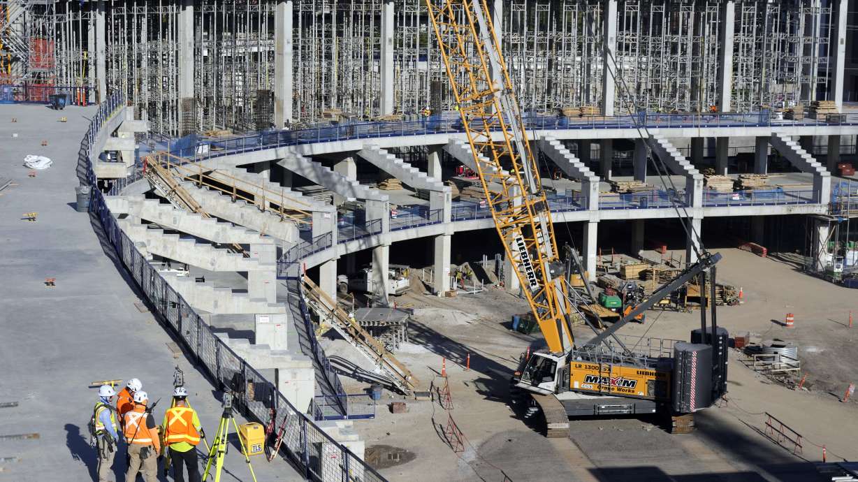 FILE - Construction continues on a new enclosed stadium for NFL football's Tennessee Titans, March 3, 2025, in Nashville, Tenn.