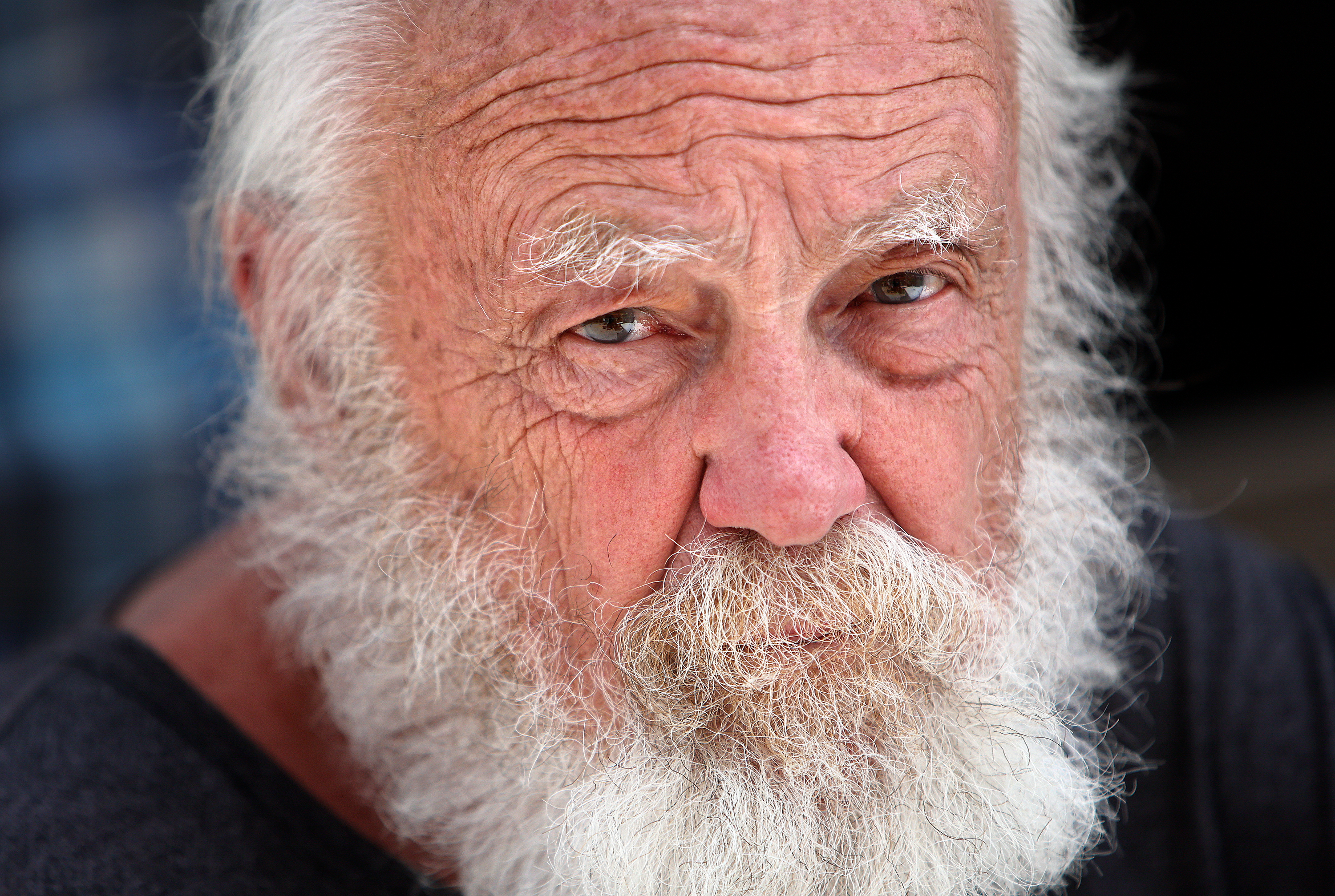 Van Perkins, an Army veteran who has been homeless for around nine months, waits between service meetings at an Unsheltered Veteran Surge Event outside of the Salt Lake City Public Library in Salt Lake City on Friday.