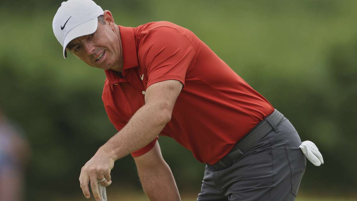 Rory McIlroy of Northern Ireland reacts on the 2nd green after putting during the third round of the British Open golf championship at the Royal Portrush Golf Club, Northern Ireland, Saturday, July 19, 2025.