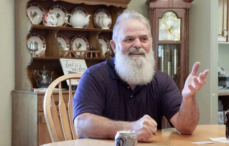 Mark Crozier at his home in the Diamond Valley neighborhood, St. George, July 9. The U.S. Army veteran and retired police detective recently decorated state Route 18 North with 30 American flags, earning him the nickname "The Flag Phantom."