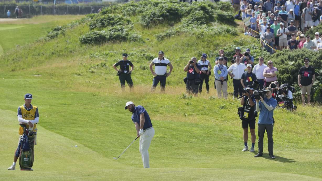 Scottie Scheffler of the United States plays s hot to the 2nd green during the final round of the British Open golf championship at the Royal Portrush Golf Club, Northern Ireland, Sunday, July 20, 2025.
