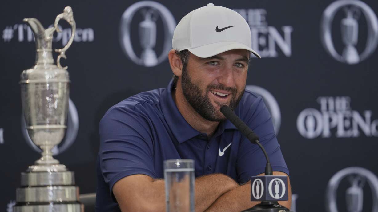 Scottie Scheffler of the United States speak at a press conference after winning the British Open golf championship at the Royal Portrush Golf Club, Northern Ireland, Sunday, July 20, 2025.