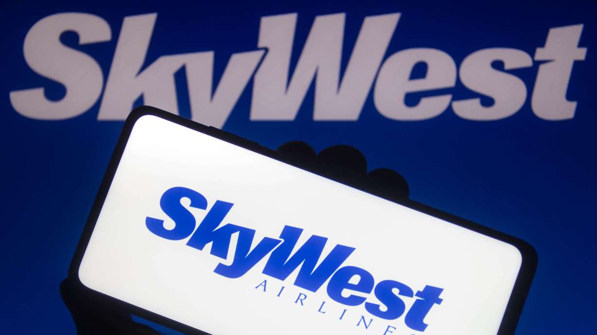 A pilot flying a SkyWest regional jet on Friday apologized to his passengers after making a hard turn to avoid colliding with a U.S. Air Force B-52 bomber.