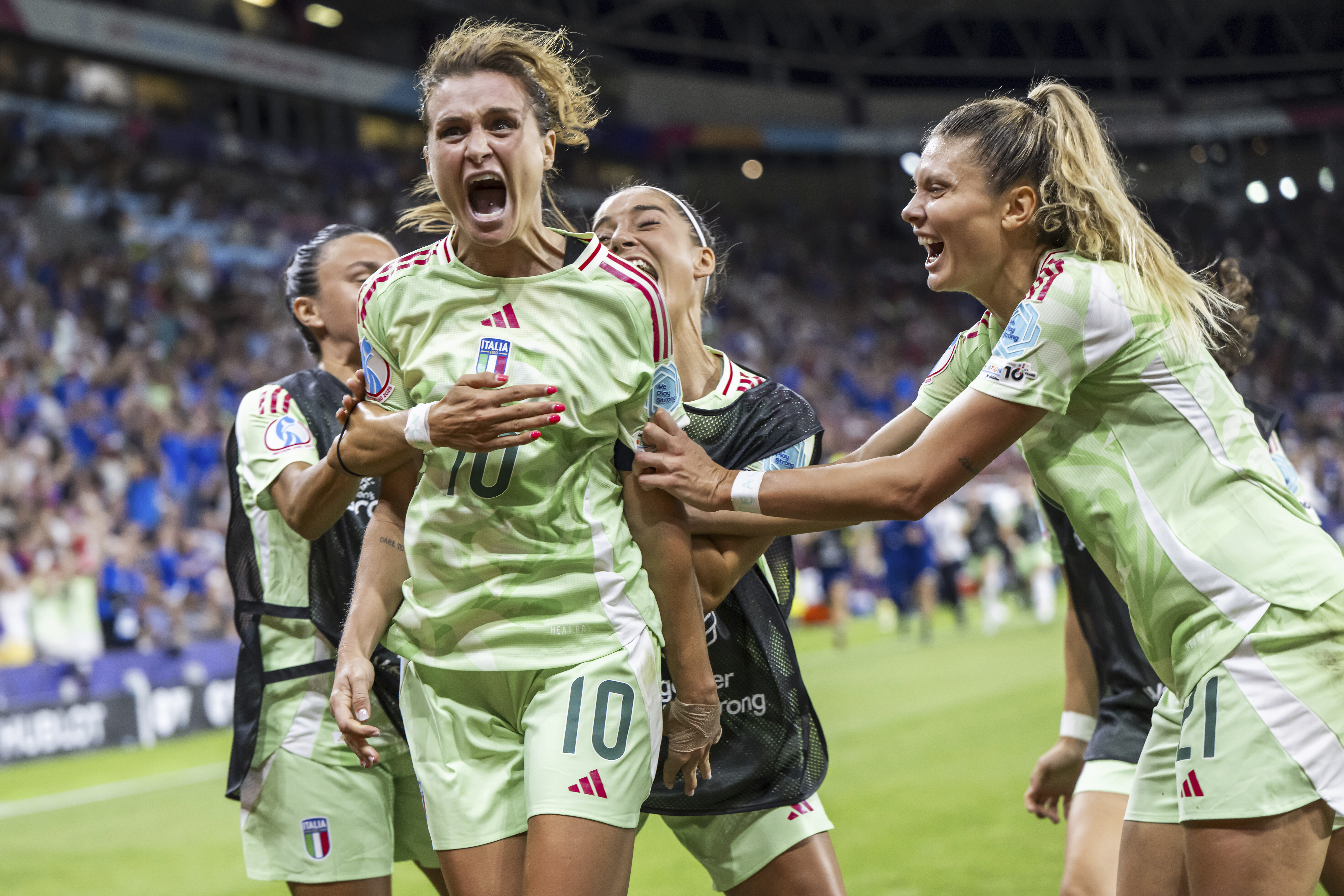 Italy's Cristiana Girelli (10) celebrates with teammates after scoring their second goal during the Women's Euro 2025 quarterfinals soccer match between Norway and Italy at Stade de Geneve in Geneva, Switzerland, Wednesday, July 16, 2025. 