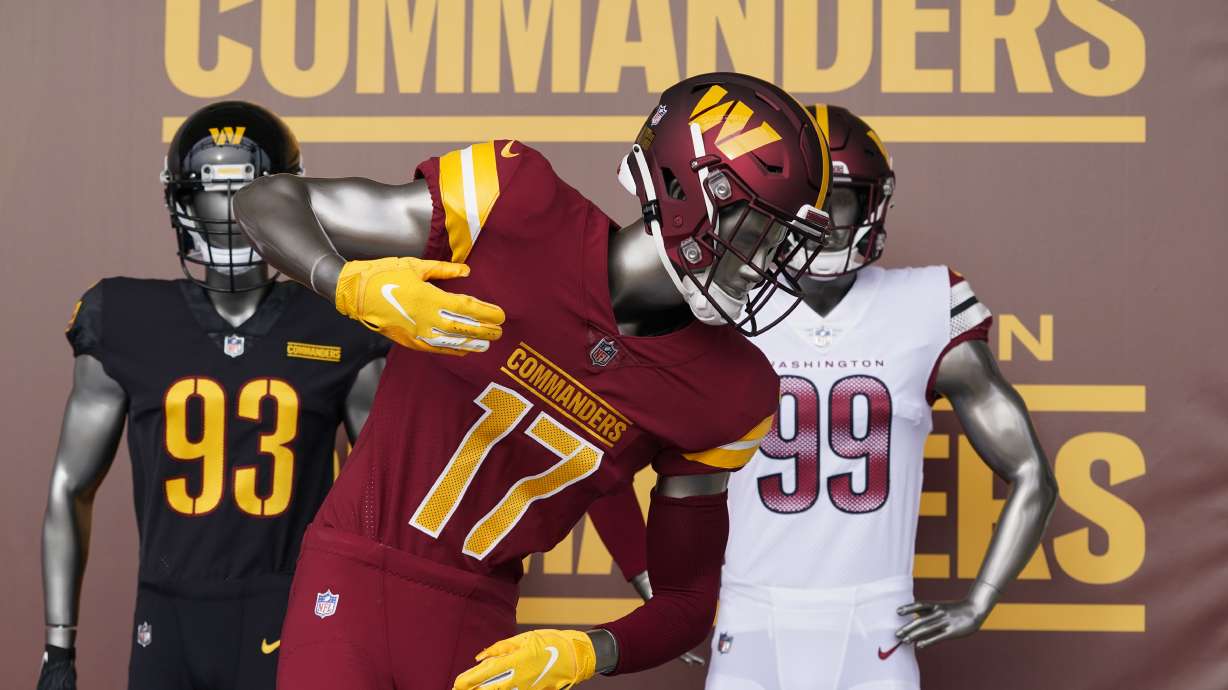FILE - Washington Commanders jerseys are displayed at an event to unveil the NFL football team's new identity, Feb. 2, 2022, in Landover, Md.