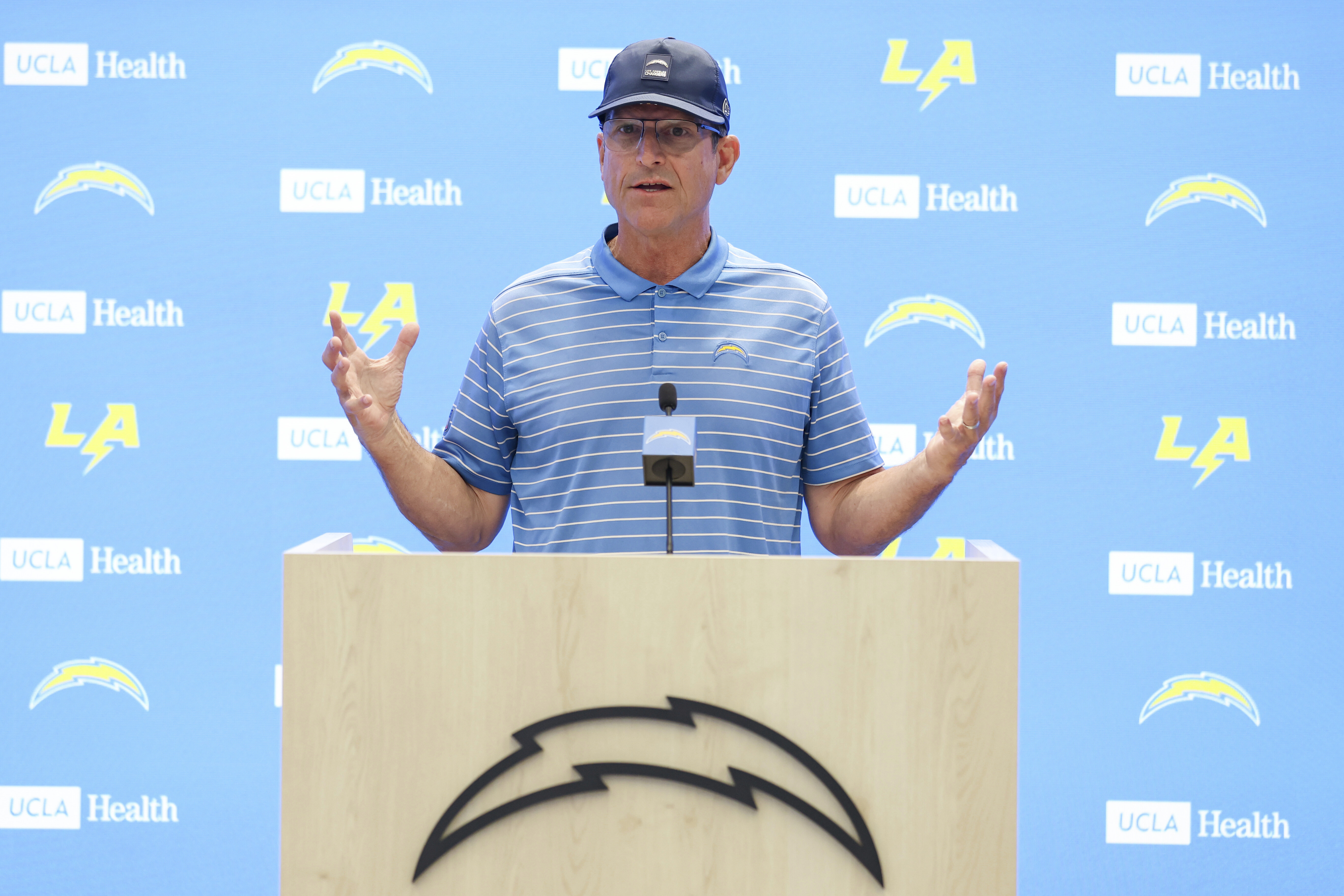 Los Angeles Chargers head coach Jim Harbaugh holds a press conference during training camp for the NFL football team Thursday, July 17, 2025, in El Segundo, Calif. 