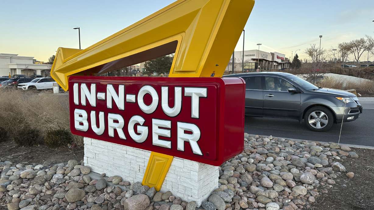 The sign outside an In-N-Out Burger restaurant Dec. 8, 2024, in Lone Tree, Colo. In-N-Out owners say their decision to relocate company headquarters is thanks to the lack of business and family-friendly policies in California.