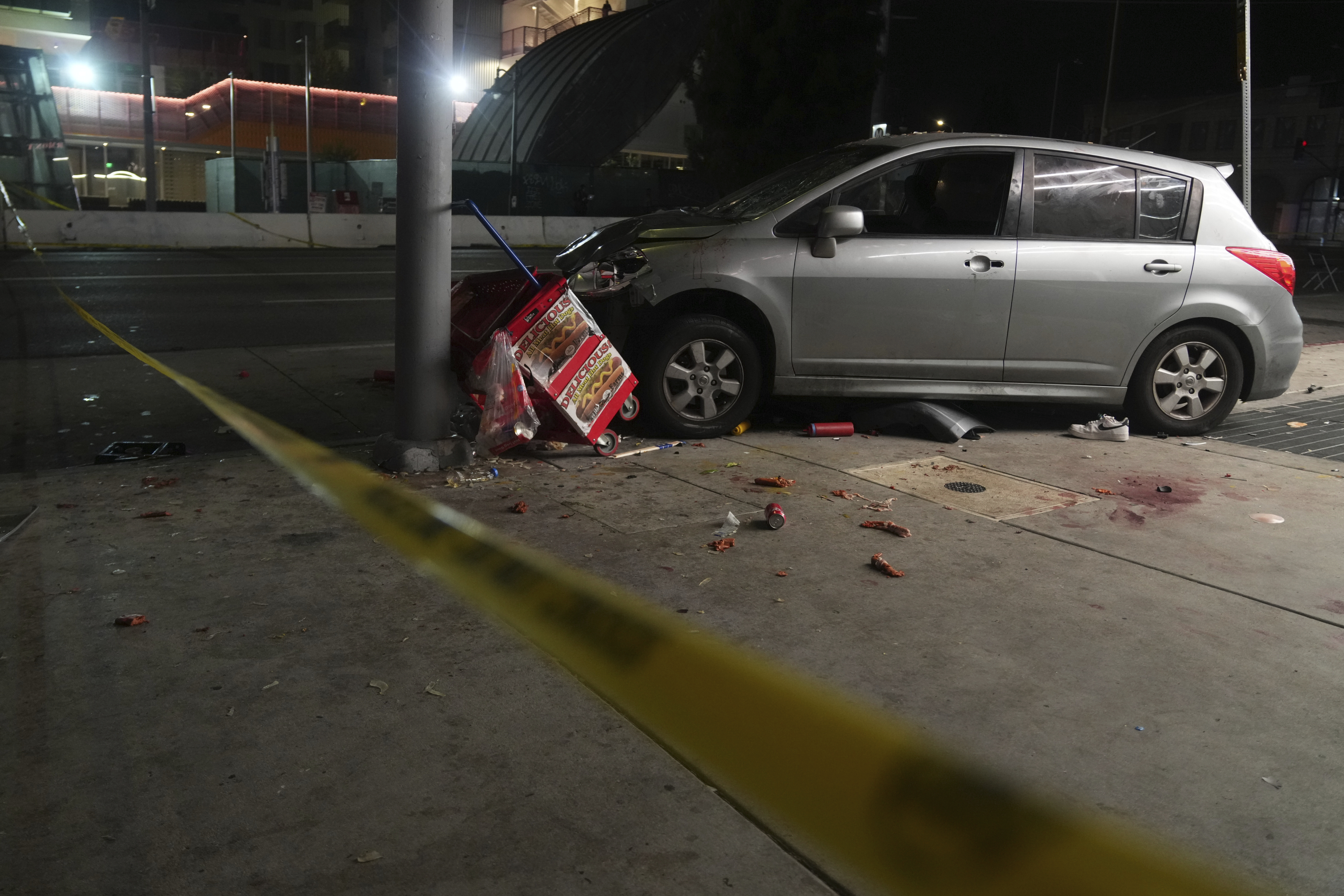 An area is roped off after a vehicle rammed into a crowd waiting to enter a nightclub in Los Angeles early Saturday. The driver, 29-year-old Fernando Ramirez, was charged with 37 counts of attempted murder Tuesday.