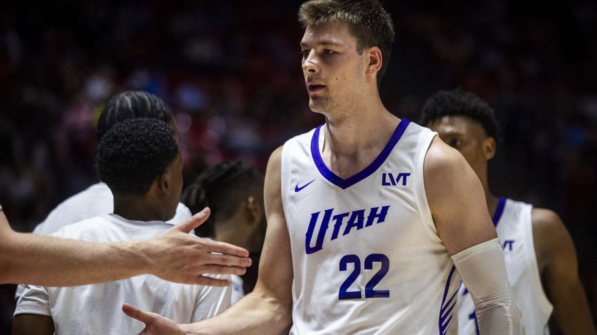 Utah Jazz forward Kyle Filipowski (22) high-fives his teammates during an NBA Salt Lake City Summer League game between the Utah Jazz and the Philadelphia 76ers at the Jon M. Huntsman Center on the campus of the University of Utah in Salt Lake City on Saturday, July 5, 2025.