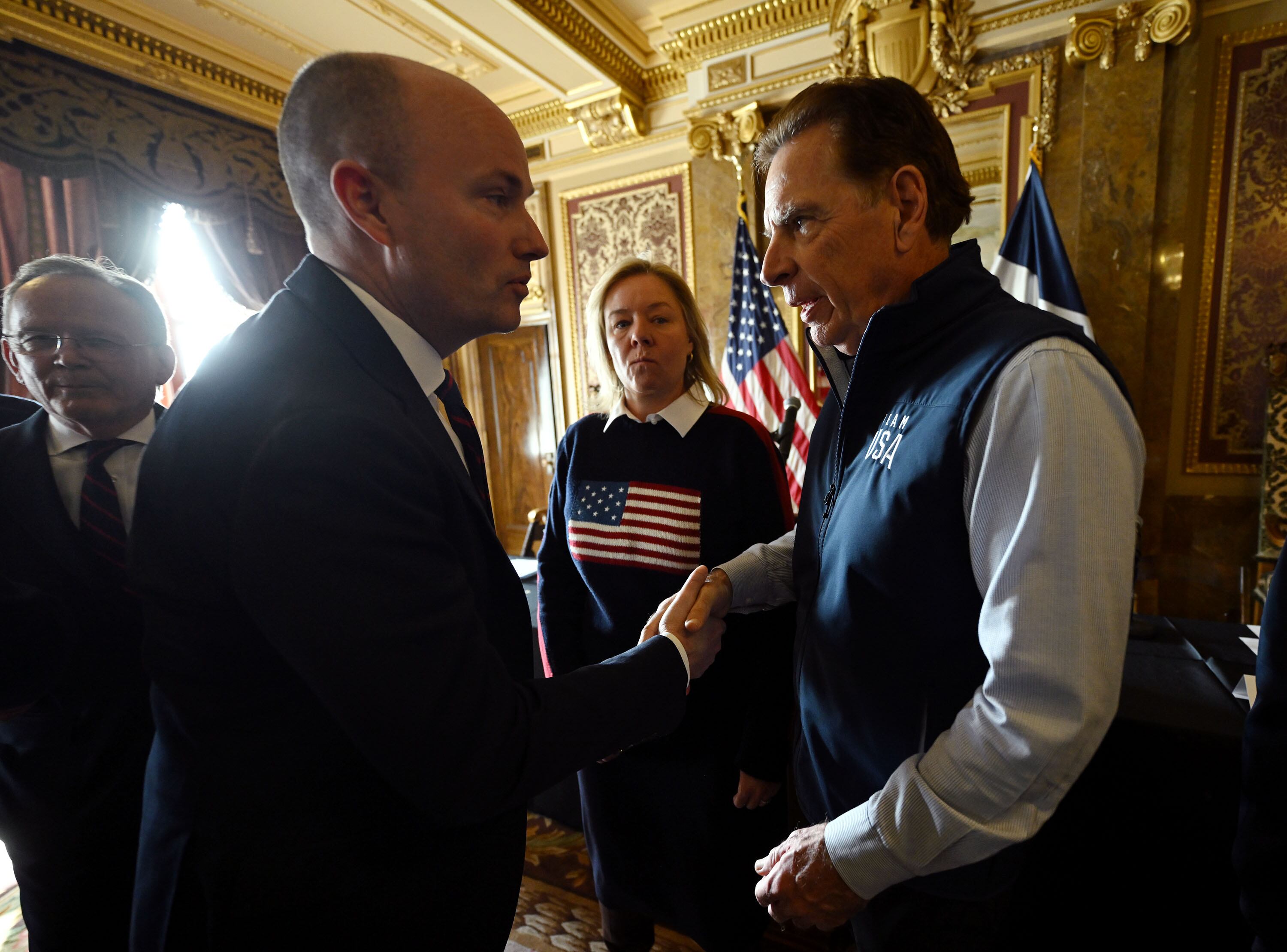 Gov. Spencer Cox talks with Fraser Bullock after a press conference in the Gold room of the Capitol in Salt Lake City, Feb. 14. Bullock talked about the need for a "breather" after the work required to secure Utah's second Winter Olympics.