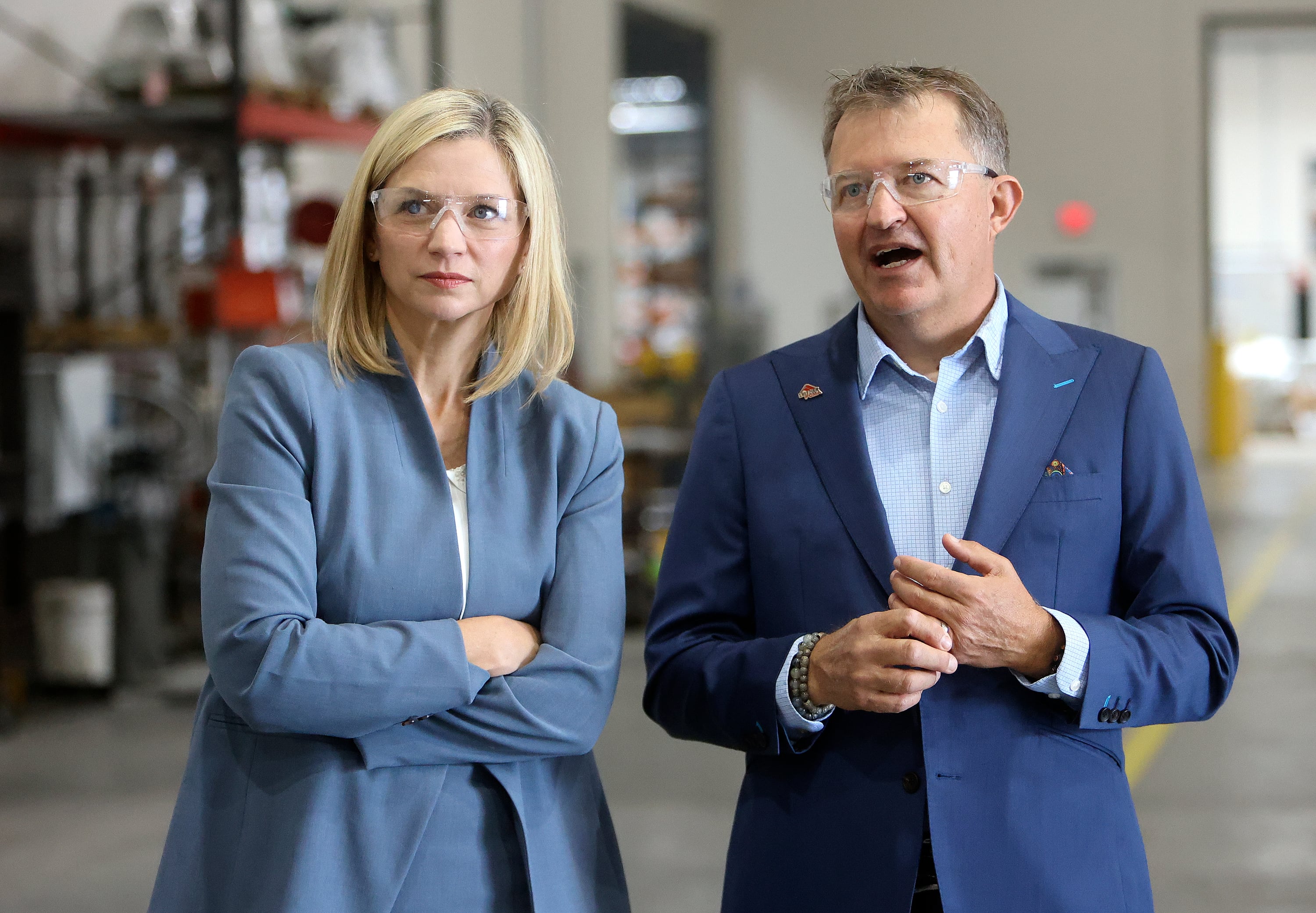 Melissa Holyoak tours the HTI Group facility with Daren Cole, president and CEO of Leitner-Poma, in Tooele on Tuesday. The visit highlighted the group's domestic production.