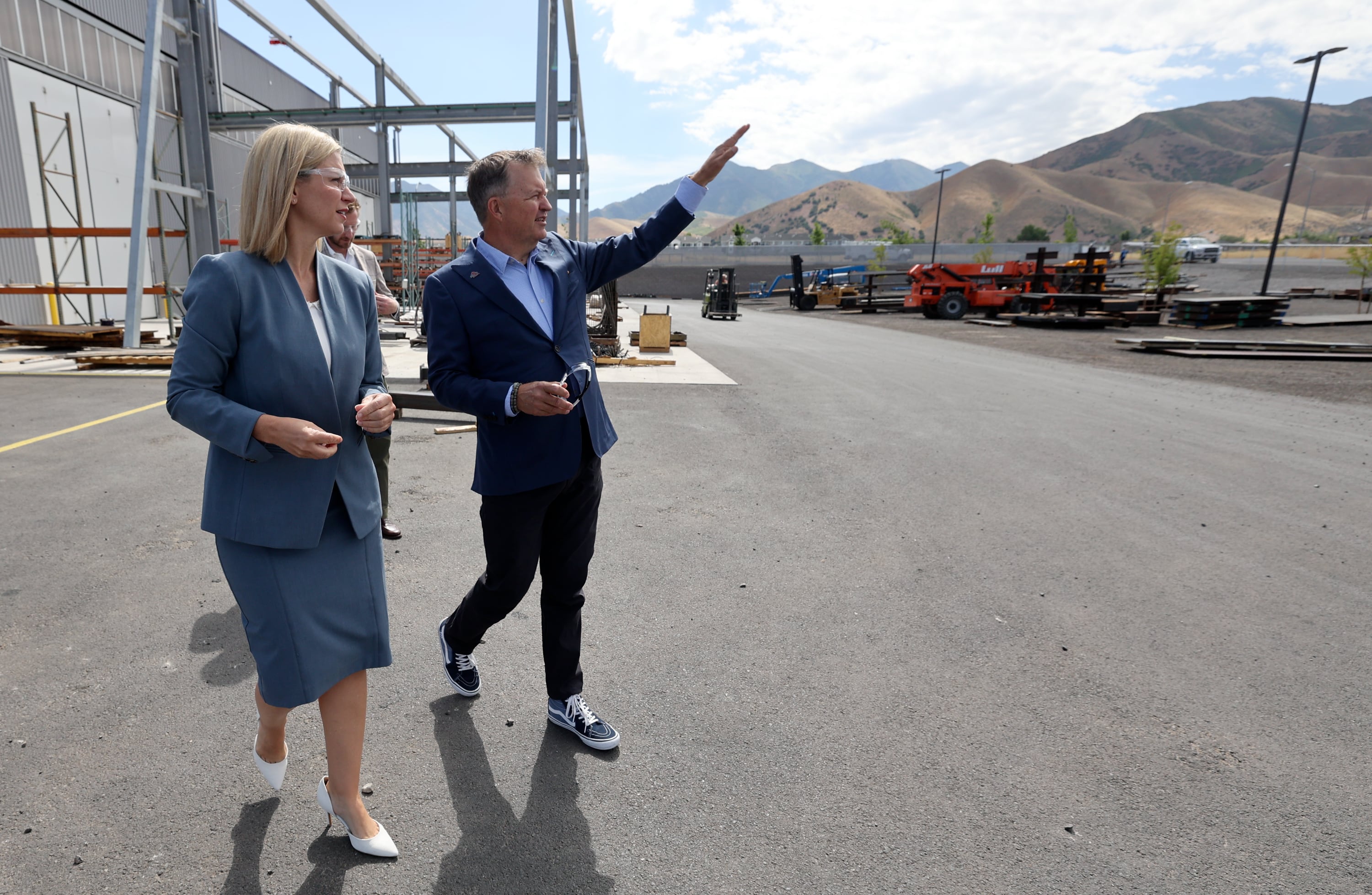 Melissa Holyoak tours the HTI Group facility with Daren Cole in Tooele on Tuesday. Holyoak said the visit taught her about promoting American entrepreneurs who are at the core of what makes the country great.