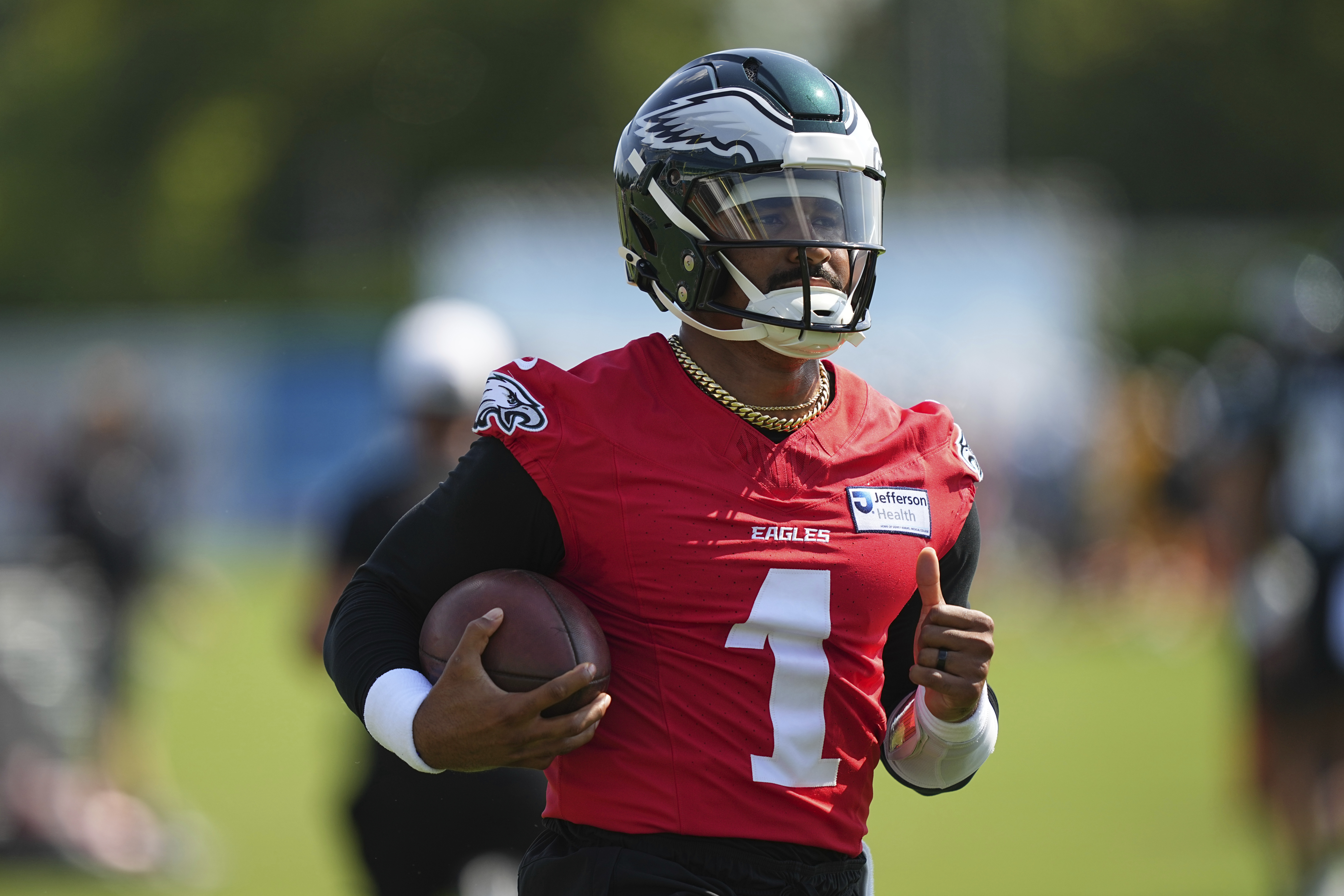 Philadelphia Eagles quarterback Jalen Hurts runs a drill during an NFL football training camp, Wednesday, July 23, 2025, in Philadelphia. 