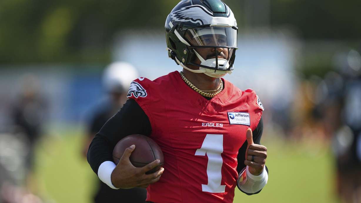 Philadelphia Eagles quarterback Jalen Hurts runs a drill during an NFL football training camp, Wednesday, July 23, 2025, in Philadelphia.