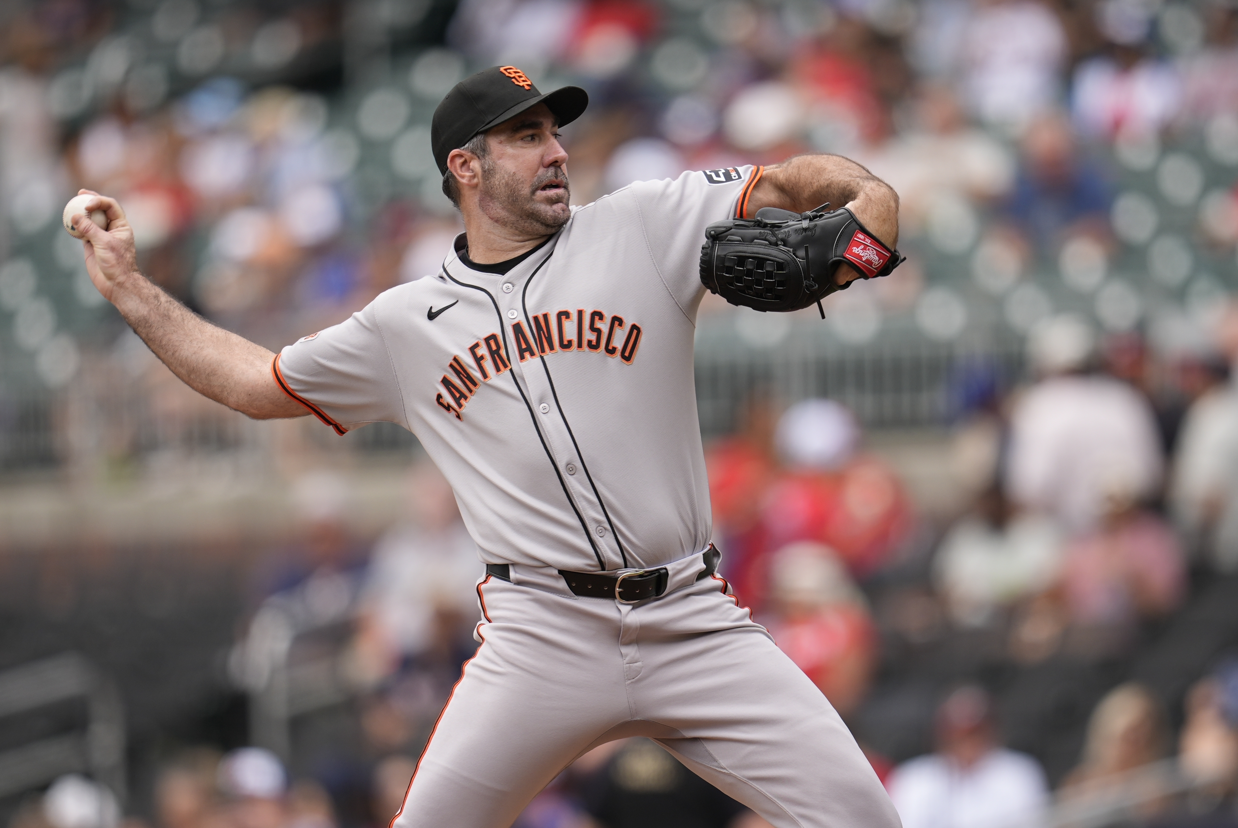 San Francisco Giants pitcher Justin Verlander (35) delivers in the first inning of a baseball game against the Atlanta Braves, Wednesday, July 23, 2025, in Atlanta. 