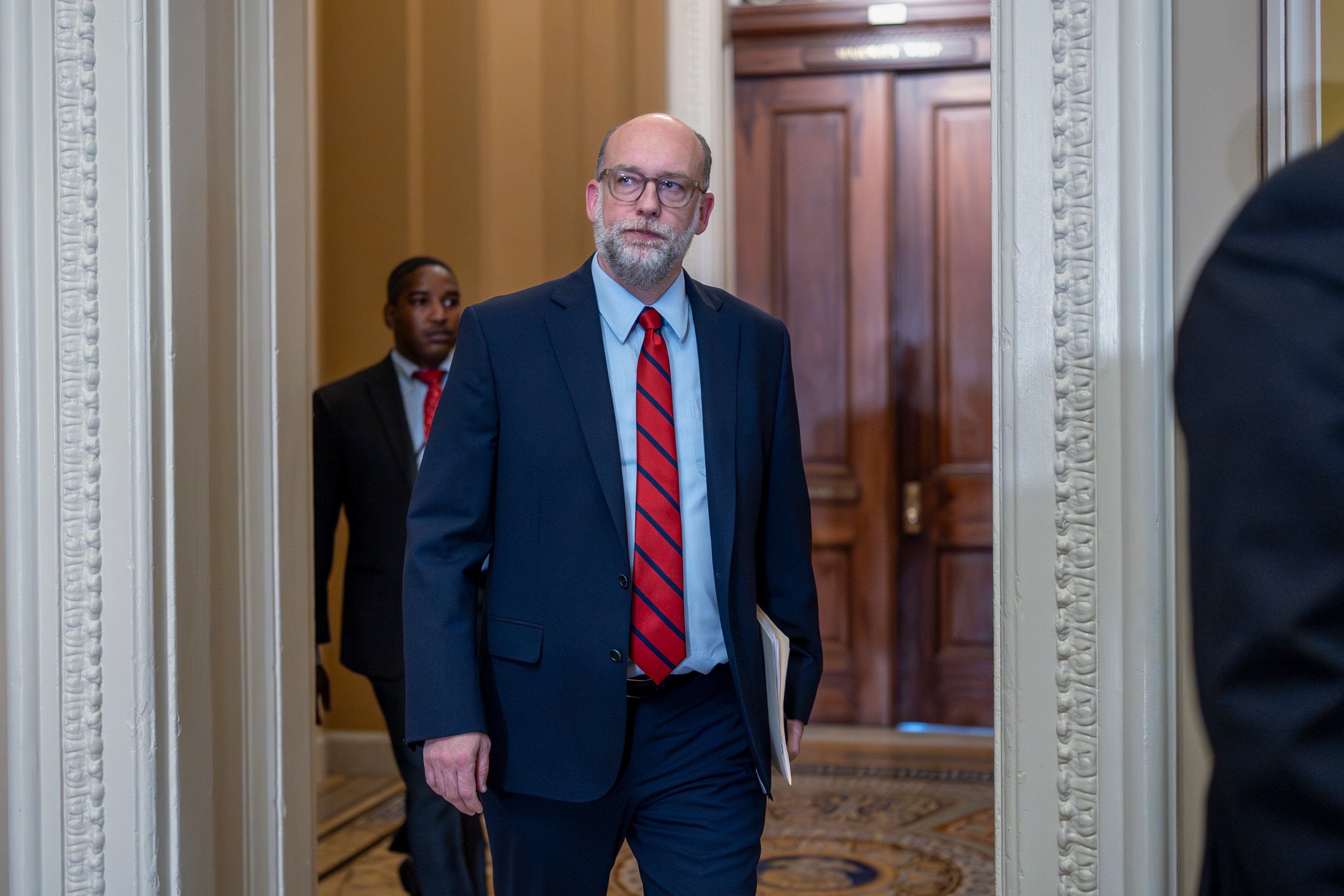 Office of Management and Budget Director Russell Vought arrives to meet with Republican senators at the Capitol in Washington, July 15. The office recently released funds that support after-school and summer programs.