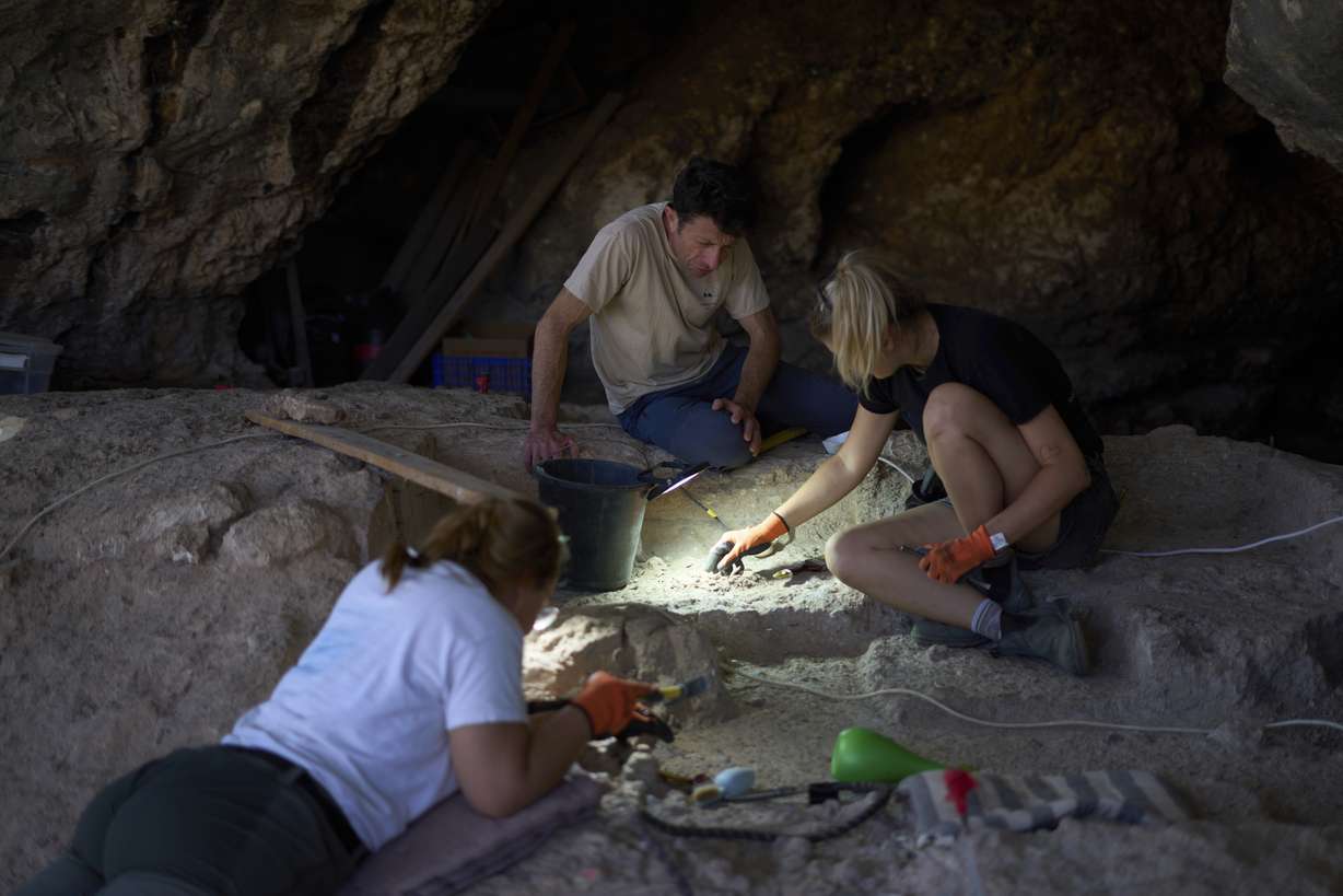 Professor of Archaeology Yossi Zaidner works in Tinshemet Cave, where archaeologists are excavating one of the world's oldest known burial sites, dating back 100,000 years, near Shoam, Israel, July 15.