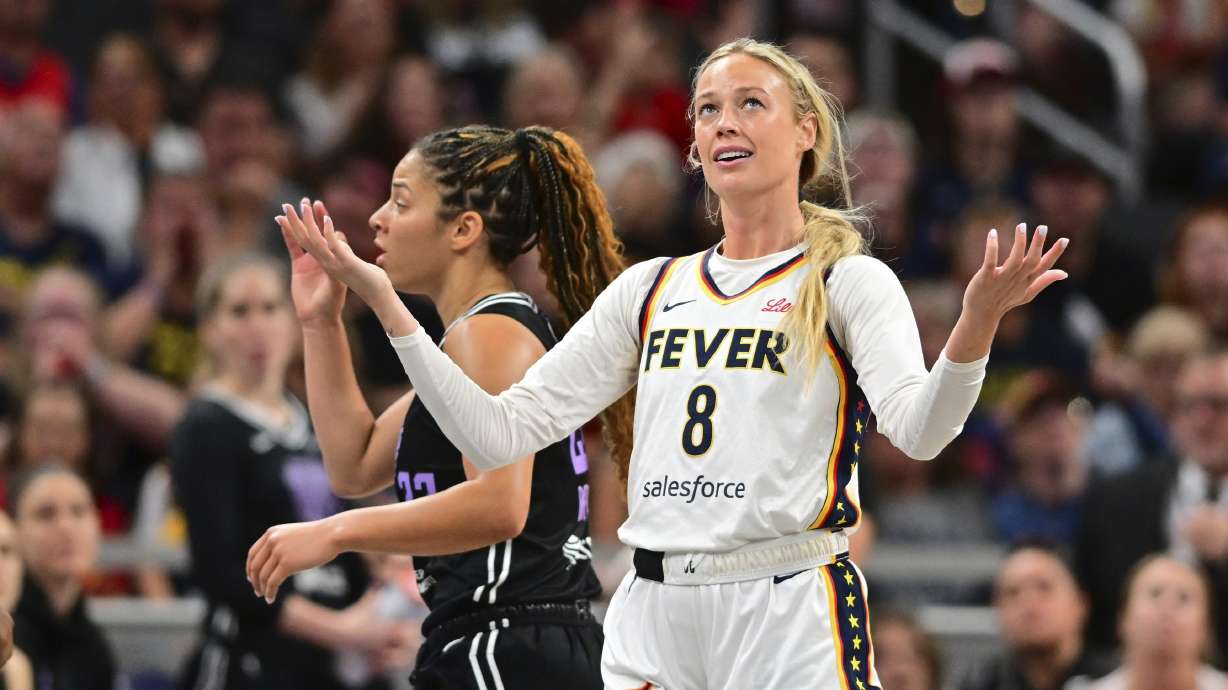 Indiana Fever's Sophie Cunningham (8) reacts to a call during the second half of a WNBA basketball game against Golden State Valkyries, Wednesday, July 9, 2025, in Indianapolis.