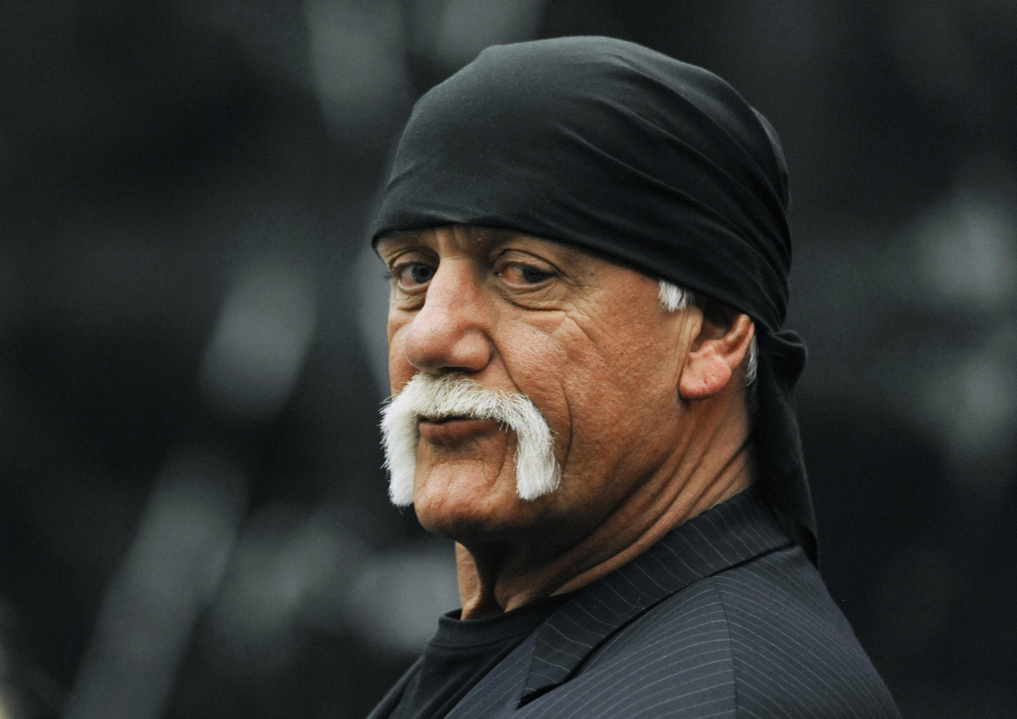 FILE - Hulk Hogan, whose given name is Terry Bollea, waits in the courtroom during a break in his trial against Gawker Media in St. Petersburg, Fla., March 9, 2016. 